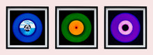 Load image into Gallery viewer, Photograph by Heidler and Heeps. 3 colourful vinyl records in a black frame sitting horizontally.