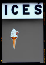 Load image into Gallery viewer, Photograph by Richard Heeps.  At the top black letters spell out ICES and below is depicted a 99 icecream cone sitting left of centre against a grey coloured background.  