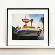 Load image into Gallery viewer, Black framed photograph by Richard Heeps.  The back end of the classic American car with a number place DREAM01 sits underneath the STARDUST casino sign.
