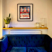 Load image into Gallery viewer, Thrill Pier clowns amusements photograph by Richard Heeps artwork framed in black in situ