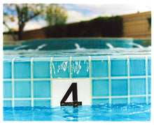 Load image into Gallery viewer, '4 Feet - El Morocco Pool' photographed in Las Vegas, Nevada is part of Richard Heeps' 'Dream in Colour' series. This enticing artwork will bring cool summer vibes to your home every day of the year. 
