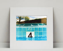 Load image into Gallery viewer, '4 Feet - El Morocco Pool' photographed in Las Vegas, Nevada is part of Richard Heeps' 'Dream in Colour' series. This enticing artwork will bring cool summer vibes to your home every day of the year. 