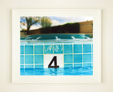Load image into Gallery viewer, '4 Feet - El Morocco Pool' photographed in Las Vegas, Nevada is part of Richard Heeps' 'Dream in Colour' series. This enticing artwork will bring cool summer vibes to your home every day of the year. 