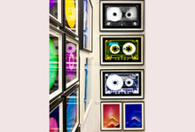 Load image into Gallery viewer, Tape Collection, 'AILA Tinted Yellow'. The Heidler &amp; Heeps collaborations are creative representations of Natasha Heidler and Richard Heeps’ personal past, and their personalities. Tapes are significant in both their lives and the work here is made from their own collections. Their unique process makes these artworks not inanimate objects, rather they have depth, texture, grit, and they even appear to move.