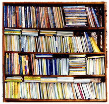 Load image into Gallery viewer, Multi-color books in a book case square photograph