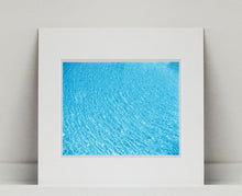 Load image into Gallery viewer, 'Algiers Pool', photographed by Richard Heeps in Las Vegas, is the perfect way to bring summer vibes into your home all year round. The glistening pool water is idyllic and inviting.  