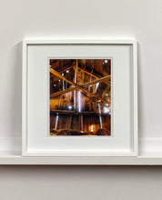 Load image into Gallery viewer, Light breaks through the cracks in the barn on the movie set of Clint Eastwood's Western film 'The Outlaw Josey Wales'. Captured in Kanab, Utah, which was the setting of many Western movies. Photographed by Richard Heeps for his 'Dream in Colour' series.