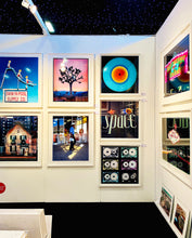 Load image into Gallery viewer, 'Boutique' is street portrait, taken in Palm Springs, California. This piece is different from Richard Heeps' usual style, but everything fell into place: the light, the colours, and the man walking through the shot.