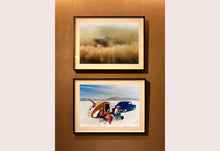 Load image into Gallery viewer, 'Christine's '52 Henry J &amp; teardrop' was captured in Bonneville Salt Flats, Utah, the iconic home of speed. This photograph shows the mountains in the distance meeting and contrasting with the flatness of the salt pan, whilst a pair of retro spectators look out at the speeding cars in the distance.