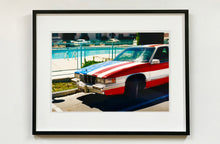 Load image into Gallery viewer, An American car parked up by the swimming pool outside the Algiers Hotel in Las Vegas. Photography by Richard Heeps, part of his 'Dream in Colour' series.