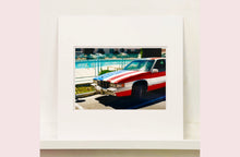 Load image into Gallery viewer, An American car parked up by the swimming pool outside the Algiers Hotel in Las Vegas. Photography by Richard Heeps, part of his 'Dream in Colour' series.