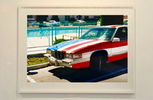 Load image into Gallery viewer, An American car parked up by the swimming pool outside the Algiers Hotel in Las Vegas. Photography by Richard Heeps, part of his 'Dream in Colour' series.