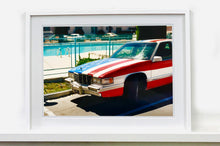 Load image into Gallery viewer, An American car parked up by the swimming pool outside the Algiers Hotel in Las Vegas. Photography by Richard Heeps, part of his 'Dream in Colour' series.