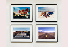 Load image into Gallery viewer, 'Christine's '52 Henry J &amp; teardrop' was captured in Bonneville Salt Flats, Utah, the iconic home of speed. This photograph shows the mountains in the distance meeting and contrasting with the flatness of the salt pan, whilst a pair of retro spectators look out at the speeding cars in the distance.