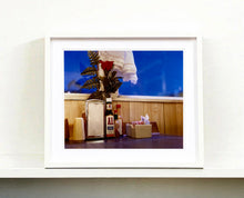 Load image into Gallery viewer, 'Condiments' shows a classic American Diner table-scape, captured at the Bonanza Café in the small town of Lone Pine, California. This piece is part of Richard Heeps' 'Dream in Colour' series.