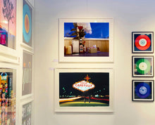 Load image into Gallery viewer, 'Condiments' shows a classic American Diner table-scape, captured at the Bonanza Café in the small town of Lone Pine, California. This piece is part of Richard Heeps' 'Dream in Colour' series.