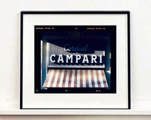 Load image into Gallery viewer, Cordial Campari, photographed as part of Richard Heeps’ series 'A Short History of Milan’ features beautiful and bold typography above the striped awning of a fascist building. 