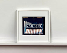 Load image into Gallery viewer, Cordial Campari, photographed as part of Richard Heeps’ series 'A Short History of Milan’ features beautiful and bold typography above the striped awning of a fascist building. 