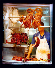 Load image into Gallery viewer, 'Crispy Duck' photographed by Richard Heeps in Kowloon, Hong Kong. Despite Richard being a vegetarian, he's interested in capturing varying attitudes towards meat, and the way in which the industry is approached by different cultures and societies. Especially as this is something that is always changing. Because of this, these artworks become socially and historically important. 