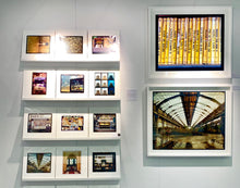 Load image into Gallery viewer, As part of Richard Heeps' series, A Short History of Milan, Delitto A Hollywood features a series of yellow Italian books from a street kiosk. 