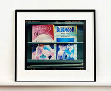 Load image into Gallery viewer, As part of Richard Heeps' series, A Short History of Milan, Desire features Italian books from a street kiosk. 