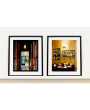 Load image into Gallery viewer, This photograph was taken inside the dining room of the iconic Parry Lodge in Kanab, Utah, which once hosted movie stars of the Western films made in the area. Their faces, cutouts from Life Magazine, adorned the wood panelled walls, which combined with the vintage interior, creates a mid-century cinematic atmosphere. This piece is part of Richard Heeps' 'Dream in Colour' series.