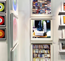 Load image into Gallery viewer, Disc Jockey, photographed by Richard Heeps at Preston Hall Museum, he was commissioned to photograph the museum before it went through regeneration. There is an air of nostalgia in the room of this interior photograph, featuring a retro table-top record player with a Decca vinyl record.
