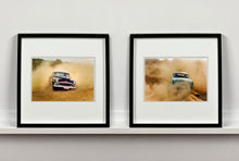Load image into Gallery viewer, 'Donut' shows a classic American car donut driving on a Norfolk beach in the East of England. This photograph was captured at Hemsby Rock and Roll weekend, and is part of Richard Heeps' Man's Ruin' series.