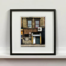 Load image into Gallery viewer, East London brick building architecture street photography by Richard Heeps framed in black.