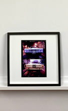 Load image into Gallery viewer,  A classic white Ford Taurus, photographed on the streets of Turro, Milan. 