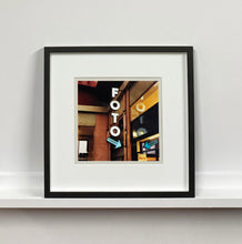 Load image into Gallery viewer, A vintage neon sign outside of a Foto Studio in Milan.