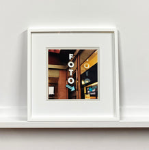 Load image into Gallery viewer, A vintage neon sign outside of a Foto Studio in Milan.