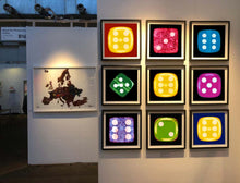 Load image into Gallery viewer, From Heidler &amp; Heeps Dice Series, a yellow dice suspended on an inky blue background.