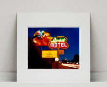 Load image into Gallery viewer, 'Lariat Motel II' is a classic Richard Heeps Americana 'Sign Porn' artwork. It was captured in its original site in Fallon, Nevada. The owners since sold the Lariat Motel and donated the 1950's sign with original neon tubing to the Churchill Arts Council. This photograph forms part of Richard Heeps' 'Dream in Colour' series.