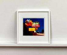 Load image into Gallery viewer, 'Lariat Motel II' is a classic Richard Heeps Americana 'Sign Porn' artwork. It was captured in its original site in Fallon, Nevada. The owners since sold the Lariat Motel and donated the 1950's sign with original neon tubing to the Churchill Arts Council. This photograph forms part of Richard Heeps' 'Dream in Colour' series.