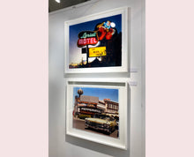 Load image into Gallery viewer, 'The Silver State' was taken by Richard whilst at Viva Las Vegas 2001, where he was photographing for Classic American magazine. This photograph which shows a vintage car in front of a typical Las Vegas backdrop was chosen as the lead image for the magazine feature which focused on the iconic La Concha motel.