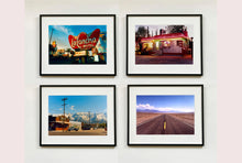 Load image into Gallery viewer, There is a cinematic style to this artwork, 'Lone Pine', taken in a former movie town in California where many Western films were made. Taken outside Richard's iconic interior photograph 'Bonanza Café', set in the Owens Valley against a mountainous  backdrop.