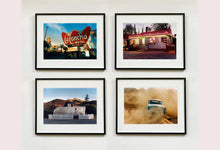 Load image into Gallery viewer, 'Mercury in the Dust I' shows a classic American car donut driving on a Norfolk beach in the East of England. This photograph was captured at Hemsby Rock and Roll weekend, and is part of Richard Heeps' Man's Ruin' series.