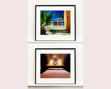 Load image into Gallery viewer, An ongoing subject of Richard's photography is the motel room. In this instance, photographed at the Lariat Motel in Fallon, Nevada. It is also often a significant location within American film and TV culture. For example, It is the backdrop for the iconic scene in the Hollywood film psycho. In this atmospheric image, the bed lights are joined together conveying a sense of coupling.