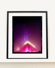 Load image into Gallery viewer, NOMAD I (Film Rebate), New York. Richard Heeps has photographed the iconic Empire State building in the mist. The NOMAD sequence of photographs capture the art deco architecture illuminated by changing colours, and is part of Richard's street photography portfolio which depict the colour, fabric and structure of cities with distinct style. This 6x7 format edition is bordered by the Kodak film rebate. 