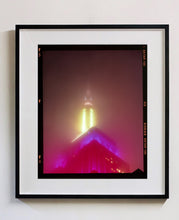 Load image into Gallery viewer, NOMAD VII (Film Rebate), New York, photography by Richard Heeps capturing the iconic Empire State building in the mist. Part of a sequence of photographs capturing the art deco architecture illuminated in changing colours. This 6x7 format edition is bordered by the Kodak film rebate. This artwork is part of Richard's portfolio of street photography he is building up which depict the colour, fabric and structure of cities with distinct style