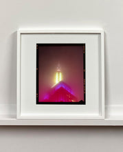Load image into Gallery viewer, NOMAD VII (Film Rebate), New York, photography by Richard Heeps capturing the iconic Empire State building in the mist. Part of a sequence of photographs capturing the art deco architecture illuminated in changing colours. This 6x7 format edition is bordered by the Kodak film rebate. This artwork is part of Richard's portfolio of street photography he is building up which depict the colour, fabric and structure of cities with distinct style