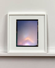 Load image into Gallery viewer, 'NOMAD VI (Film Rebate)', New York. Richard Heeps has photographed the iconic Empire State building in the mist. The NOMAD sequence of photographs capture the art deco architecture illuminated by changing colours, and is part of Richard's street photography portfolio which depict the colour, fabric and structure of cities with distinct style. This 6x7 format edition is bordered by the Kodak film rebate. 