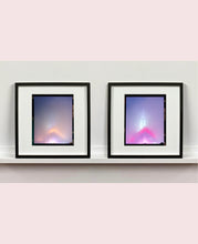 Load image into Gallery viewer, 'NOMAD VI (Film Rebate)', New York. Richard Heeps has photographed the iconic Empire State building in the mist. The NOMAD sequence of photographs capture the art deco architecture illuminated by changing colours, and is part of Richard's street photography portfolio which depict the colour, fabric and structure of cities with distinct style. This 6x7 format edition is bordered by the Kodak film rebate. 