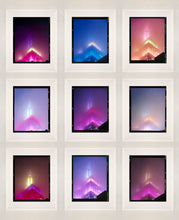 Load image into Gallery viewer, NOMAD VII (Film Rebate), New York, photography by Richard Heeps capturing the iconic Empire State building in the mist. Part of a sequence of photographs capturing the art deco architecture illuminated in changing colours. This 6x7 format edition is bordered by the Kodak film rebate. This artwork is part of Richard's portfolio of street photography he is building up which depict the colour, fabric and structure of cities with distinct style
