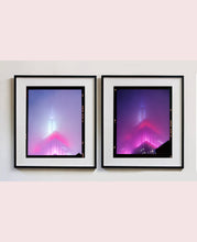Load image into Gallery viewer, 'NOMAD V (Film Rebate)', New York. Richard Heeps has photographed the iconic Empire State building in the mist. The NOMAD sequence of photographs capture the art deco architecture illuminated by changing colours, and is part of Richard's street photography portfolio which depict the colour, fabric and structure of cities with distinct style. This 6x7 format edition is bordered by the Kodak film rebate. 
