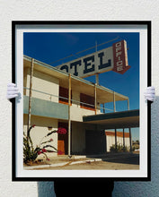 Load image into Gallery viewer, 'North Shore Motel Office II' from Richard Heeps' 'Salton Sea' series. This artwork shows a deep blue sky over this Californian classic mid-century modern Americana Motel exterior. This photograph was captured by Richard Heeps in 2003 but only executed in his darkroom for the first time in Spring 2020.