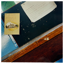 Load image into Gallery viewer, Photograph by Richard Heeps.  A noticeboard in a Scout Hut has a handmade leaflet for Oliver Cromwell's House pinned on it.  This sits alongside an old typed note on the Firework Code.