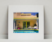 Load image into Gallery viewer, Palm Springs Pool Side II showcases classic mid-century Palm Springs California architecture. Cool blue skies and pool with accents of pink and almost neon yellow. From Richard Heeps Dream in Colour series.