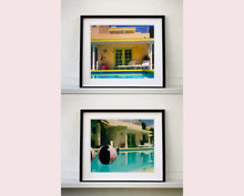 Load image into Gallery viewer, Part of Richard Heeps' 'Dream in Colour' Series, 'Beach Ball' captures Palm Springs mid-century modern architecture behind a trio of pink and black beach balls. The stillness and the subtle colours combine to make a calming artwork with a seductive cinematic vibe.